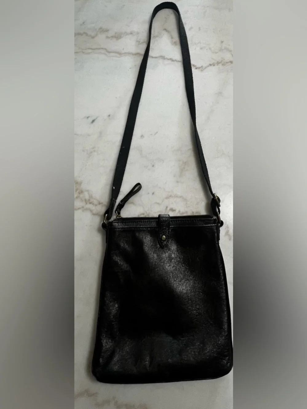 The Sak Black Leather Crossbody Bag with Gold Hardware And Colorful Lining